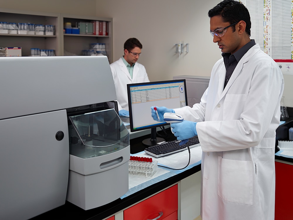 BD FACSCanto™ equipment in use by a scientist in a lab.
